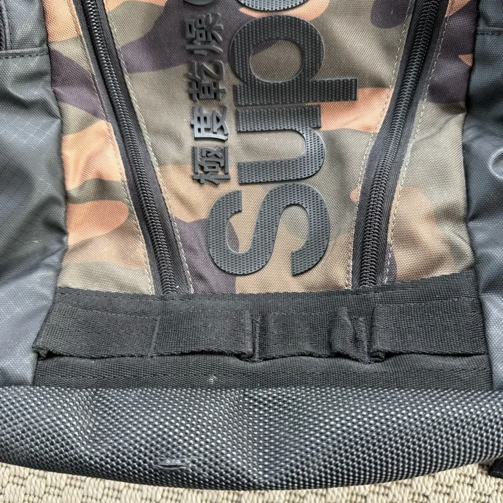 Superdry green camo backpack
